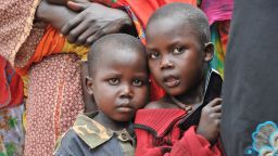 Children wait in front of the Bangui air force base for their evacuation to Chad on February 6, 2014. 