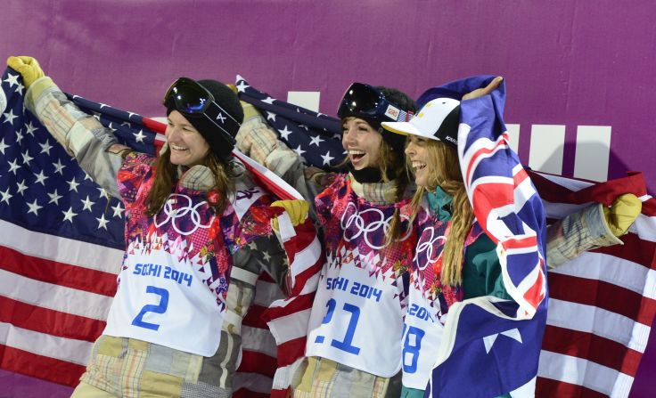 Gold medalist Kaitlyn Farrington (center) celebrates with Bronze winner Kelly Clark (L) and silver medalist, Australia's Torah Bright at the snowboard halfpipe final of the 2014 Winter Olympics. Shortly after, Farrington was diagnosed with a spinal condition which forced her out of the sport.  
