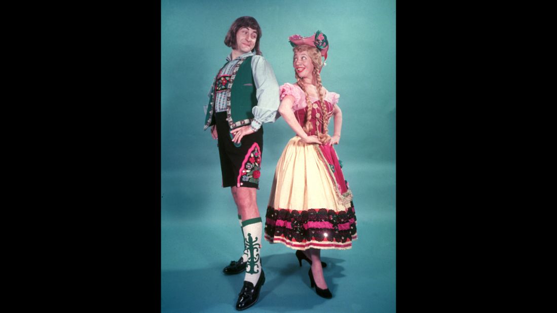 Caesar and Imogene Coca wear Bavarian costumes during a promotional photo shoot for the 1950s television program "Your Show of Shows."