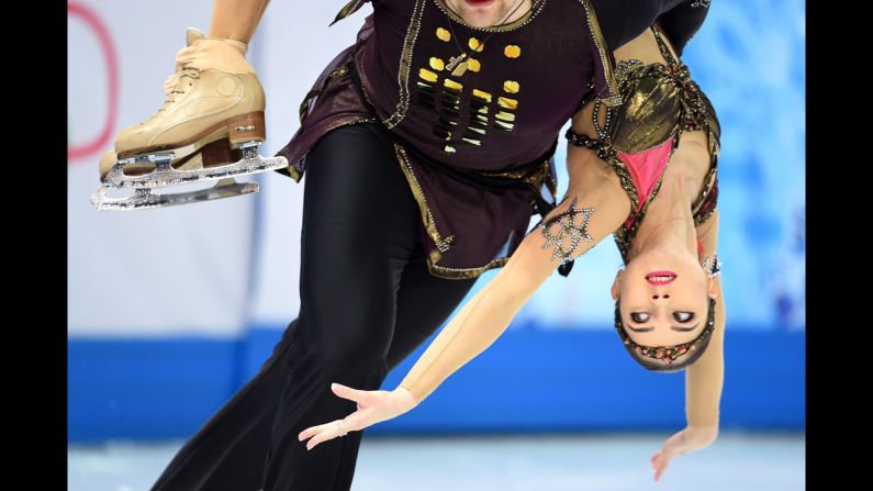 Russia's Vera Bazarova lets partner Yuri Larionov do the lifting during pairs figure skating on February 12.