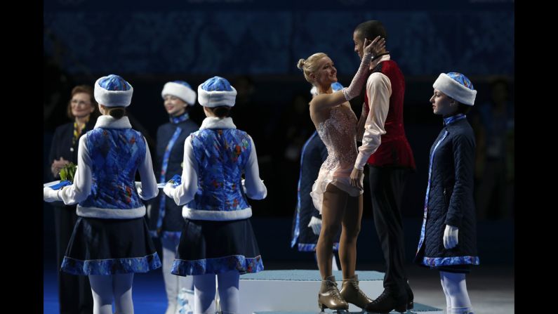 Germany's Aliona Savchenko and Robin Szolkowy receive the bronze medal for pairs figure skating on February 12.