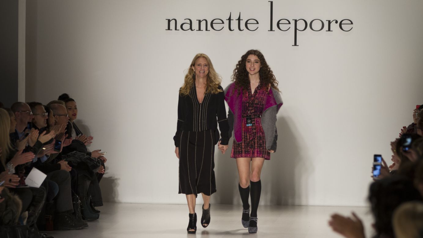 Nanette Lepore walks down the runway with her daughter, Violet, after showing her fall collection.