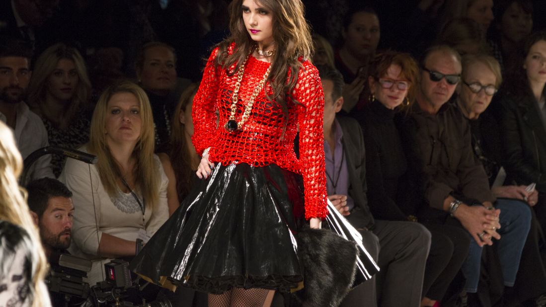 Betsey Johnson played with texture by lining a black skirt with tulle and crocheting a red mesh top.