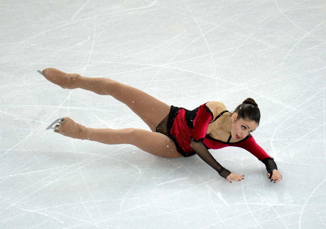 Italy's Stefania Berton falls as she performs with Italy's Ondrej Hotarek during pairs figure skating on February 12.
