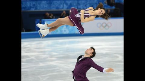 Canada's Meagan Duhamel and Eric Radford compete in pairs figure skating on Wednesday, February 12.