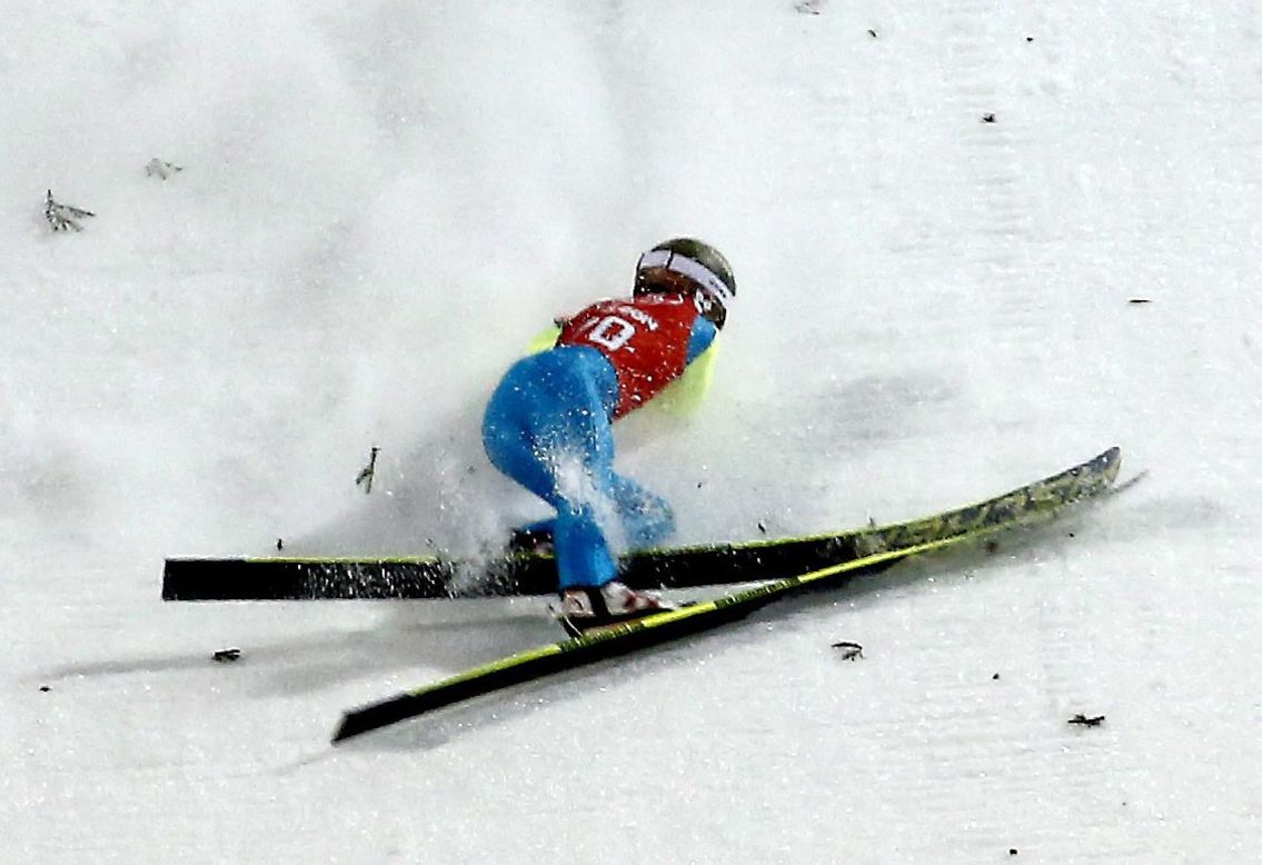 Kamil Stoch of Poland crashes during a training session for the large hill ski jumping event on February 12.