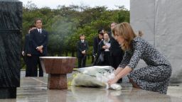 U.S. Ambassador to Japan Caroline Kennedy places a bouquet of flowers at a cemetery of war dead killed in the World War II at the Peace Memorial Park in Itiman, Okinawa prefecture on February 12, 2014.