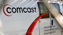 MOUNT PROSPECT, IL - DECEMBER 05: Comcast service truck outside of a Comcast Payment and Technical Facility December 5, 2005 in Mount Prospect, Illinois. Comcast, along with other cable companies nationwide, are planning on raising their rates as soon as the first of the year. (Photo by Tim Boyle/Getty Images)