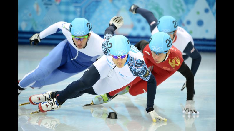 From left, Israel's Vladislav Bykanov, Russia's Vladimir Grigorev, China's Han Tianyu and Great Britain's Richard Shoebridge compete in a 1,000-meter short track speedskating race on February 13.