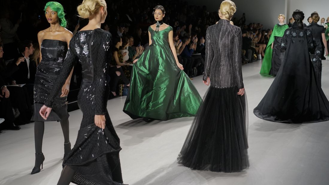 Later in the show, he upped the flashy factor by incorporating Kelly green into gowns, bowties and even updos.
