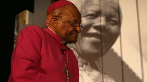 Archbishop Desmond Tutu attends an exhibition on Nelson Mandela in Cape Town, South Africa, in 2013.