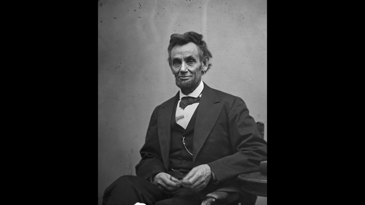 President Abraham Lincoln holds his spectacles and a pencil in February 1865. A year earlier, a pamphlet called "Miscegenation" accused Lincoln of supporting interracial sex to create an "American race." It was a hoax meant to cost him his re-election. It didn't work, but the rumor never truly died.  