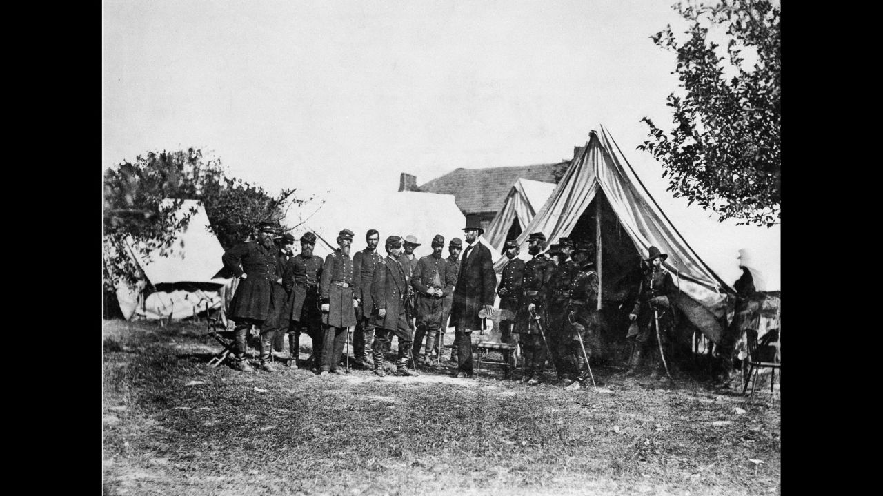 Another view shows Lincoln with McClellan and his officers at the Antietam battlefield in Maryland. The 1862 battle has been called "the bloodiest single day in American history": 23,000 men were killed or injured. After the battle, Lincoln issued the Emancipation Proclamation, which was quickly dubbed the "Miscegenation Proclamation" by his pro-slavery foes.