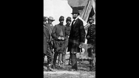 President Lincoln stands with Gen. George McClellan (facing Lincoln) at the Antietam battlefield in Maryland in 1862, during the Civil War.  The anonymous authors of the "Miscegenation" pamphlet hoped to add to Lincoln's dimming popularity as the bloody war seemed to drag on forever.