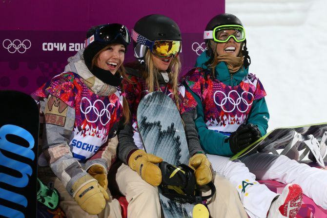 American snowboarders Kaitlyn Farrington and Hannah Teter, along with Australia's Torah Bright, smile as they wait for the final results in their halfpipe competition.