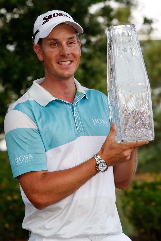 Stenson shows off the TPC winner's trophy. The win took him to a then career high ranking of world no. 5.  