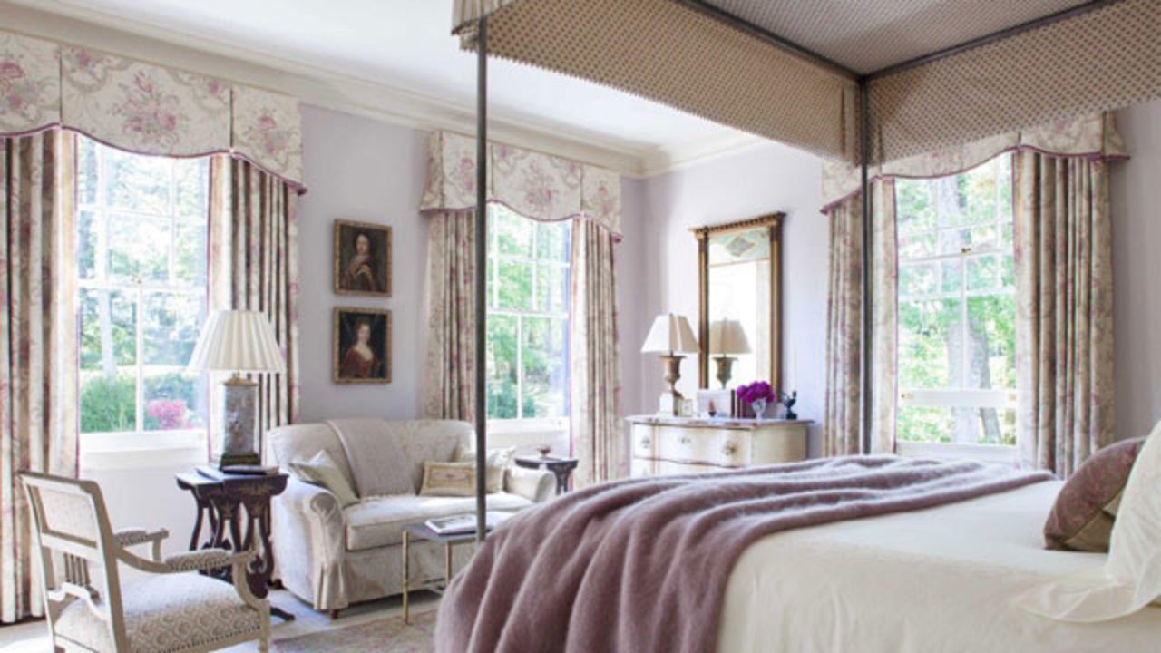 This bedroom, designed by Amelia Handegan, from the July/August 2013 issue of Veranda, focuses on the comfort of guests, from the luxurious bed throw to thoughtfully placed task lighting and seating that anticipates quiet, private moments. 