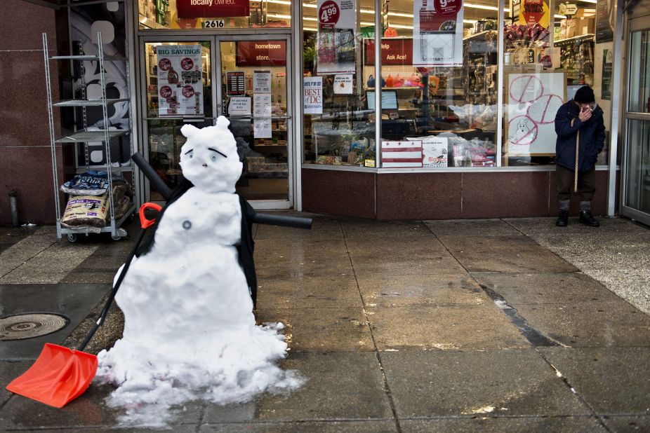 A snowman is seen in front of a hardware store in Washington on February 13.