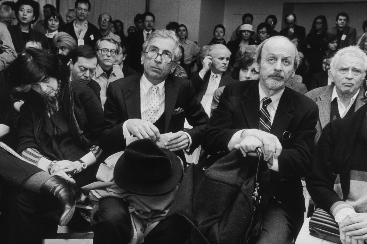 American authors Susan Sontag, left, Gay Talese, E L Doctorow and Norman Mailer are seated at Writers In Support of Salman Rushdie, New York City on February 22, 1989. Sontag was the president of PEN American Center and rallied American writers to support Rushdie.