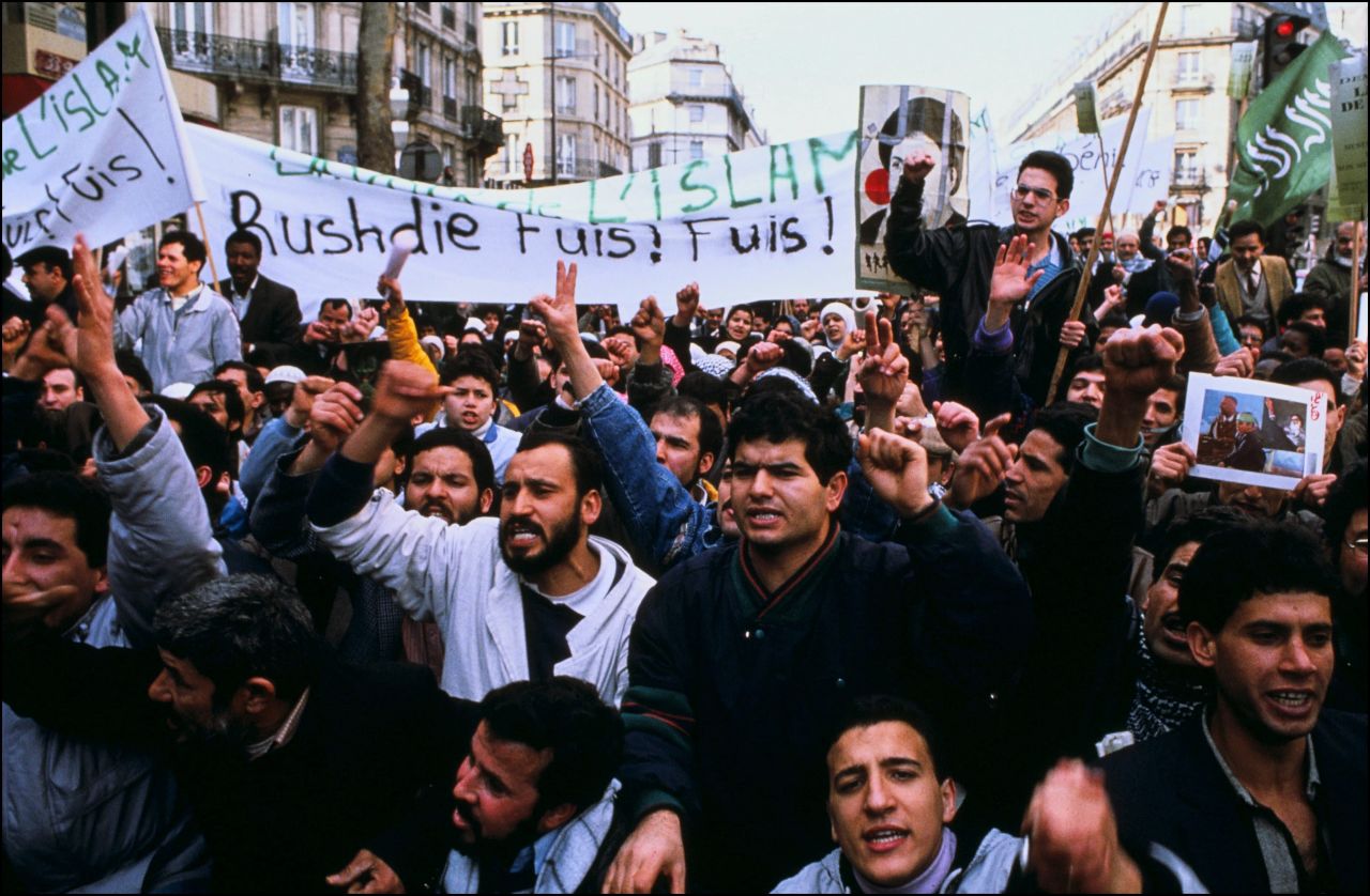 A demonstration against Rushdie and his novel takes place in Paris in November 1989.