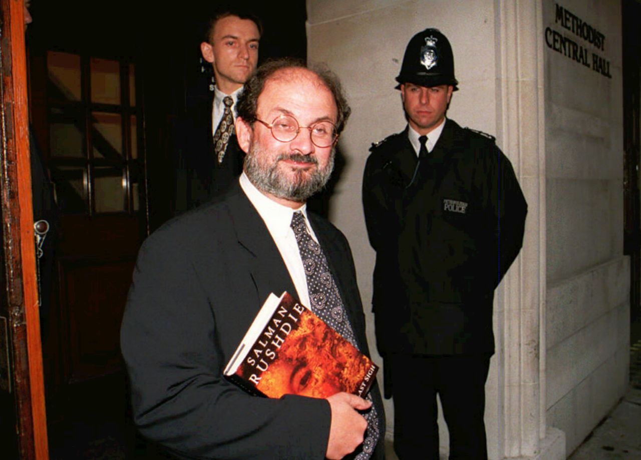 Rushdie arrives at London's Central Hall on Thursday September 7, 1995, to participate in a public forum "Writers Against the State." Rushdie holds under his arm a copy of "the Moor's Last Sigh," his first major novel since "The Satanic Verses."