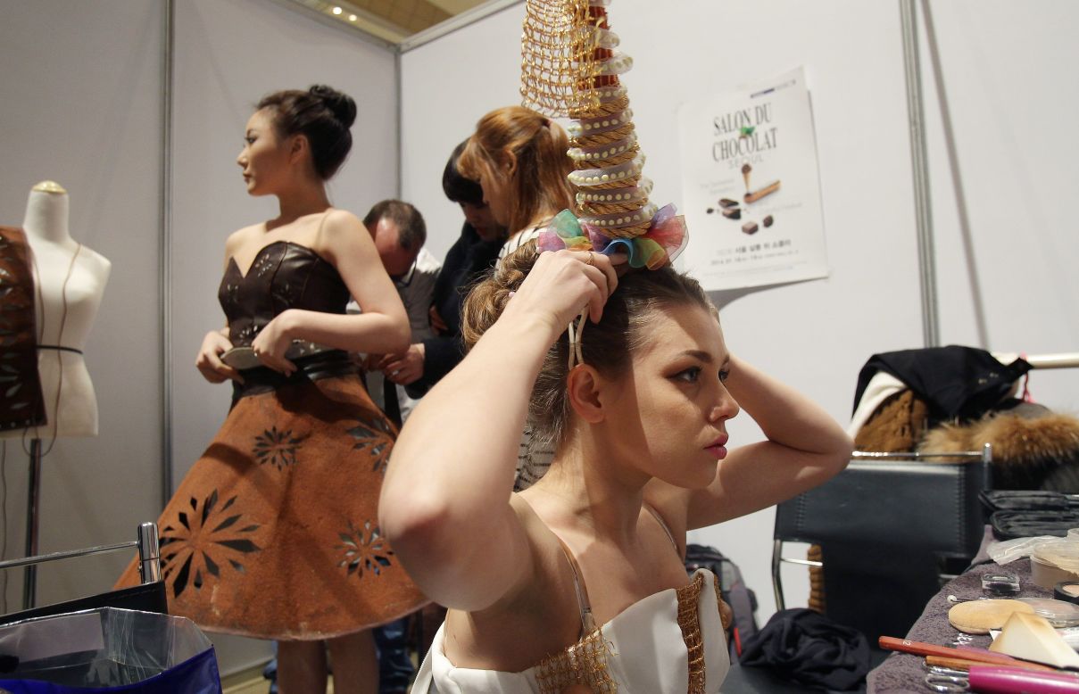 A model is styled backstage ahead of the Chocolate Fashion Show during the Salon Du Chocolat 2014 at the COEX Hall on January 16, 2014 in Seoul, South Korea.