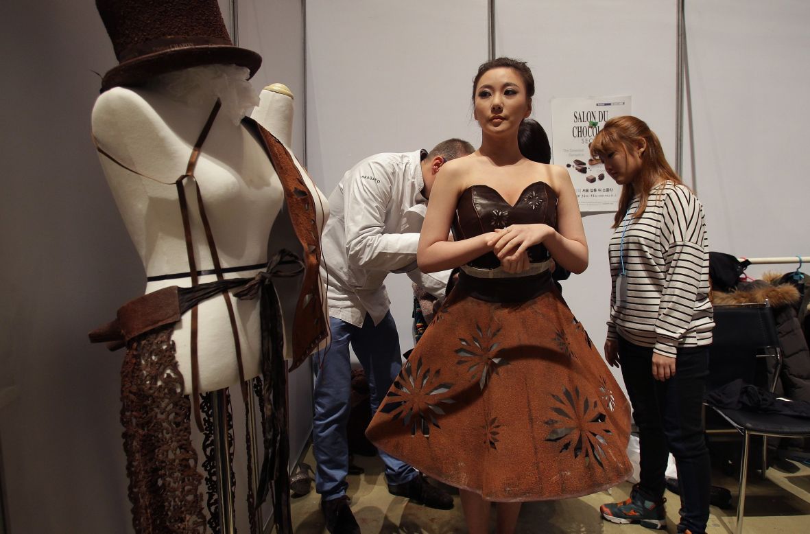 A model is styled backstage ahead of the Chocolate Fashion Show during the Salon Du Chocolat 2014 at the COEX Hall on January 16, 2014 in Seoul, South Korea.