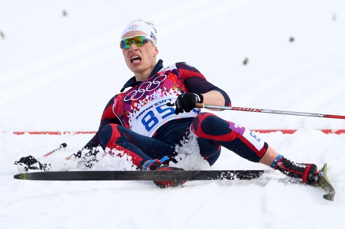 Saevar Birgisson of Iceland collapses after competing in the men's 15-kilometer classic.