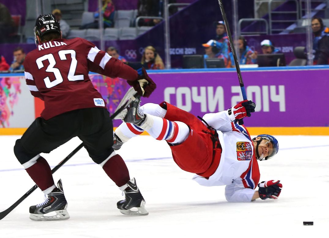 Hockey player Martin Erat of the Czech Republic falls to the ice February 14.