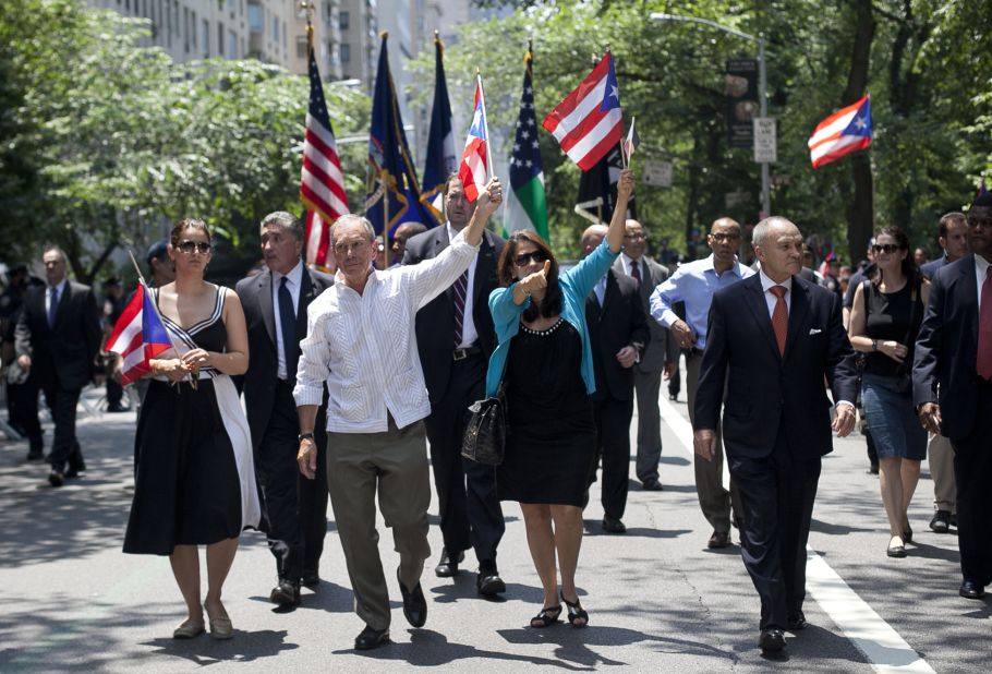 <strong>Do genuinely try to relate:</strong> Former  New York Mayor Michael Bloomberg, a Republican turned independent, could barely speak a lick of Spanish, but his oftentimes hilarious attempts endeared him to  the city's Spanish-speaking residents. He's shown here at the Puerto Rican Day Parade on June 10, 2012.
