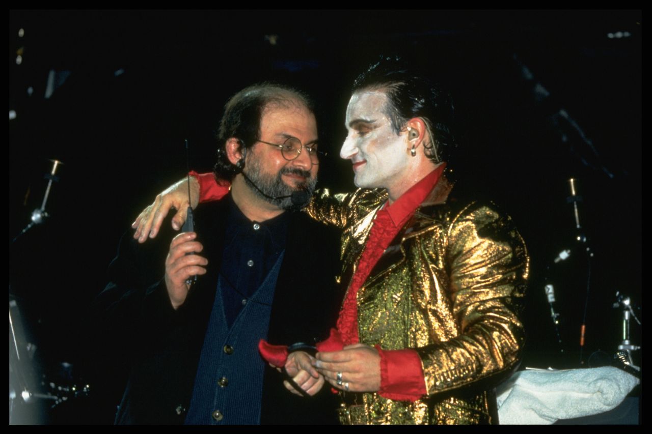 Rushdie appears on stage with Bono from the band U2 on August 11, 1993, at Wembley Stadium in London. With the author in hiding, the band invited him to appear as an act of solidarity.