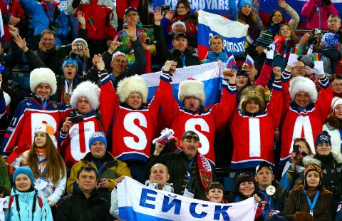 Russian fans watch the women's 15-kilometer biathlon on February 14.
