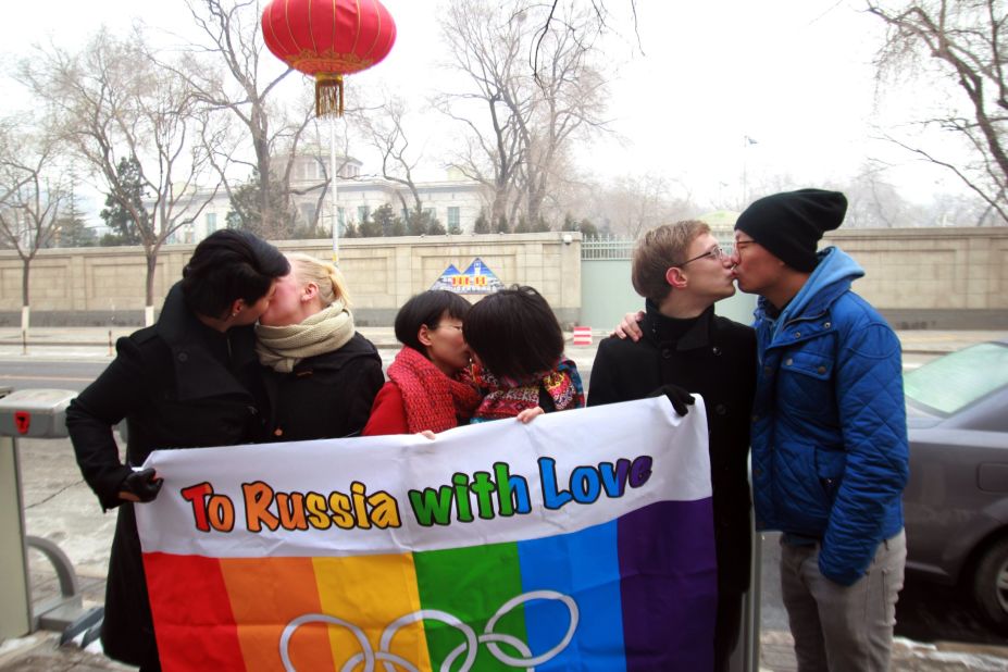 It wasn't just Winter Olympians celebrating Valentine's Day. Here a group of gay and lesbian activists hold a banner of the rainbow flag, the Olympic rings and the words "To Russia with love" as they stage a Valentine's Day kissing protest in Beijing.
