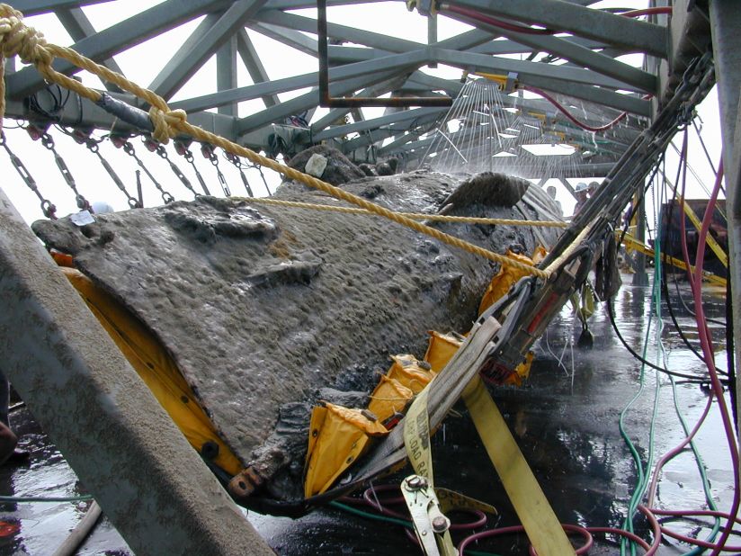 Conservators later began a new process -- filling the tank that holds the Hunley with chemicals that helped strip away what is called "concretion": organic material that has coated the hull and interior.