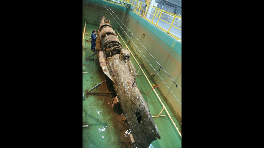 Visitors to a laboratory and exhibit hall in North Charleston, South Carolina, can gaze down on the Hunley on weekends. The large tank is empty when scientists in the Hunley Project are at work.