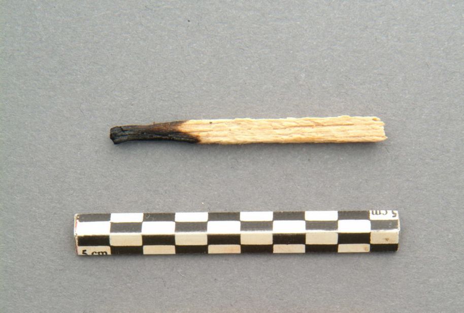 This burnt matchstick was found buried in the sediment-filled interior of the H.L. Hunley. 