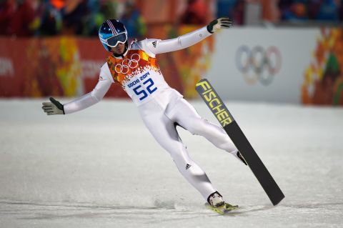 Robert Kranjec of Slovenia finishes a jump during the men's large hill ski jumping event Friday, February 14. 
