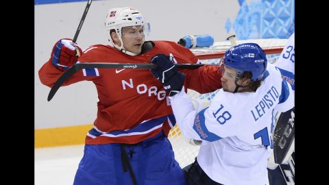 Finland's Sami Lepisto vies with Norway's Patrick Thoresen during the men's ice hockey game on February 14.