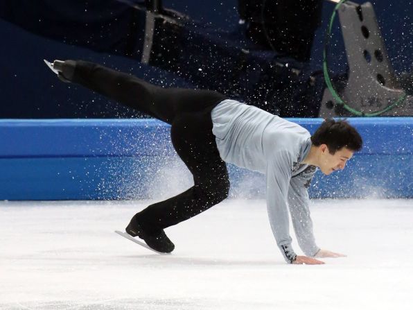 Patrick Chan of Canada falls during the men's figure skating competition on February 14.