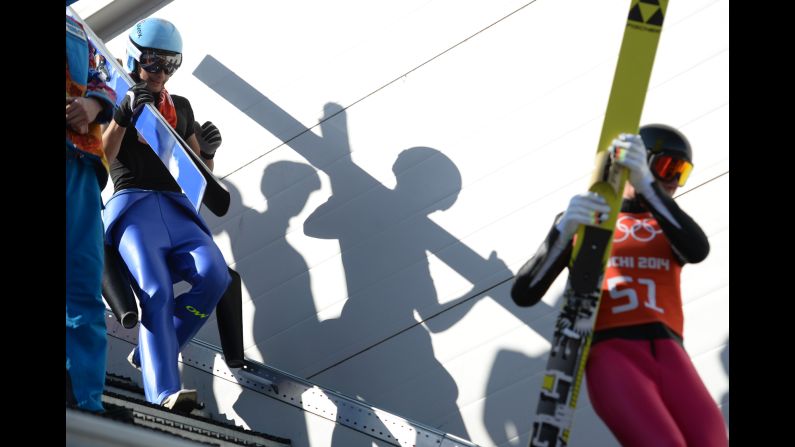 France's Jason Lamy Chappuis, left, and Germany's Johannes Rydzek are seen during a training jump for the Nordic combined on February 15.