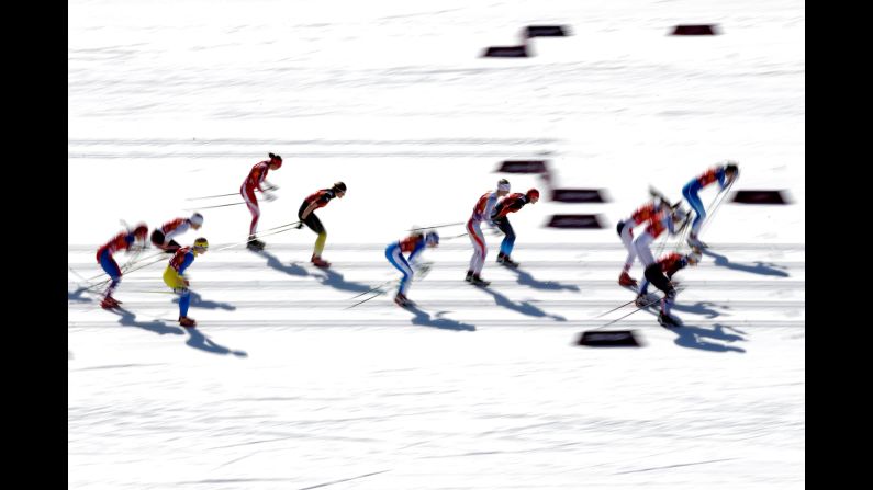 Skiers start the women's cross-country relay on February 15.