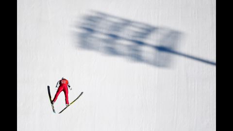 Eric Frenzel of Germany jumps during training for the large hill Nordic combined event February 15.