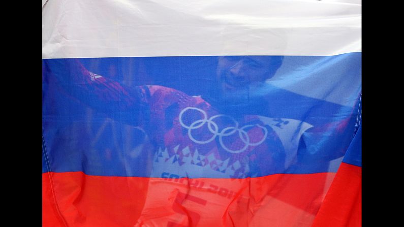 Alexander Tretiakov of Russia celebrates winning the men's skeleton final on February 15.