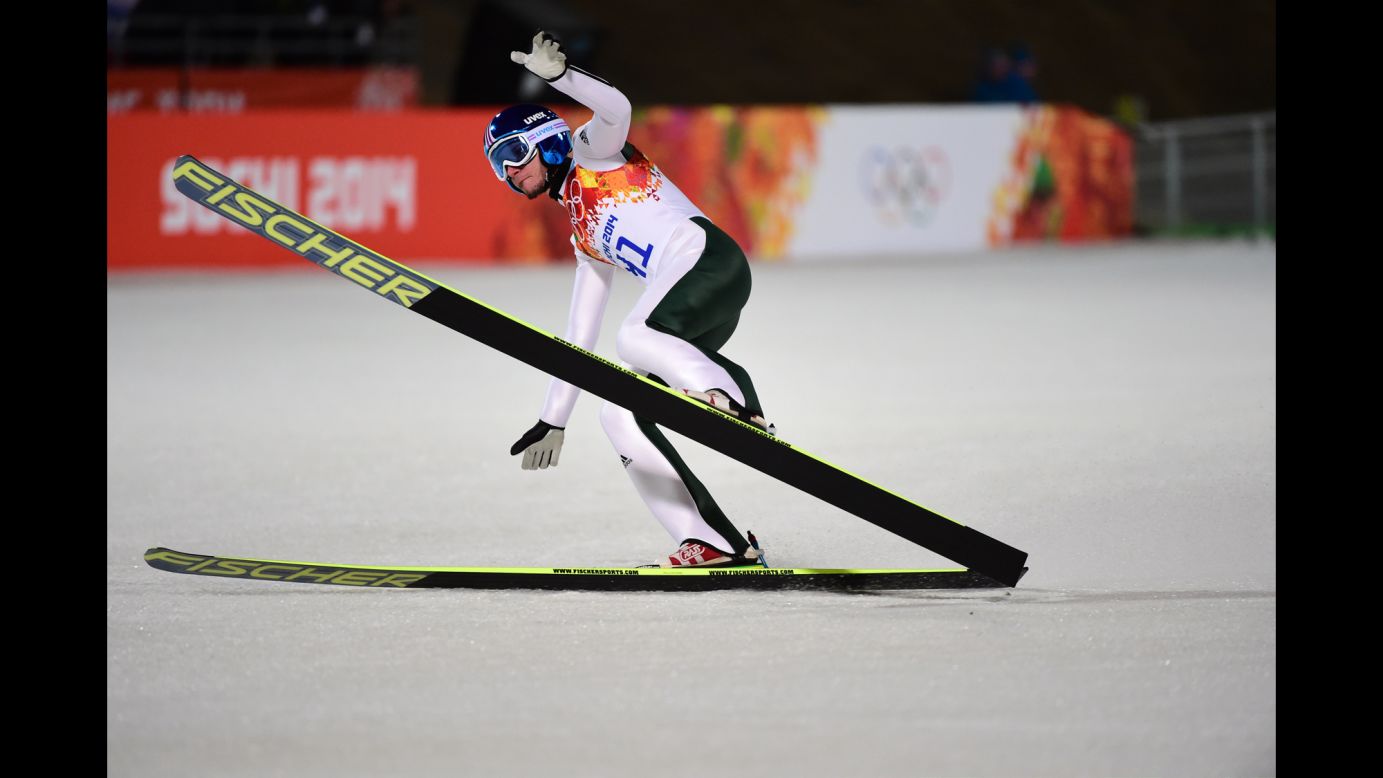 Slovenia's Robert Kranjec reacts in the finish area during the first round of the men's large hill ski jumping event.