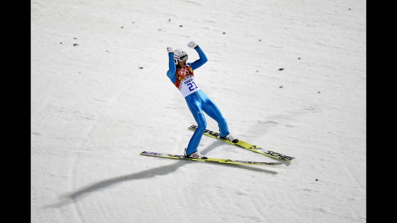 Reruhi Shimizu of Japan lands his jump February 15 in the men's large hill ski jumping event.