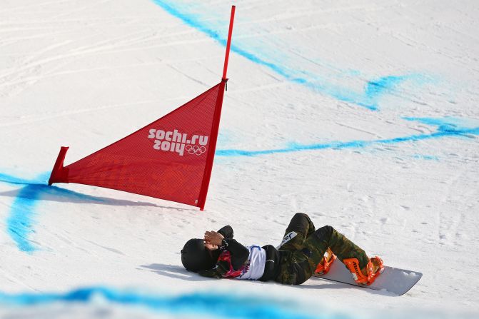 Yuka Fujimori of Japan falls during the women's snowboard cross on February 16.