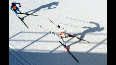 Finland's Lari Lehtonen and Sweden's Johan Olsson compete in the men's cross-country relay on February 16.