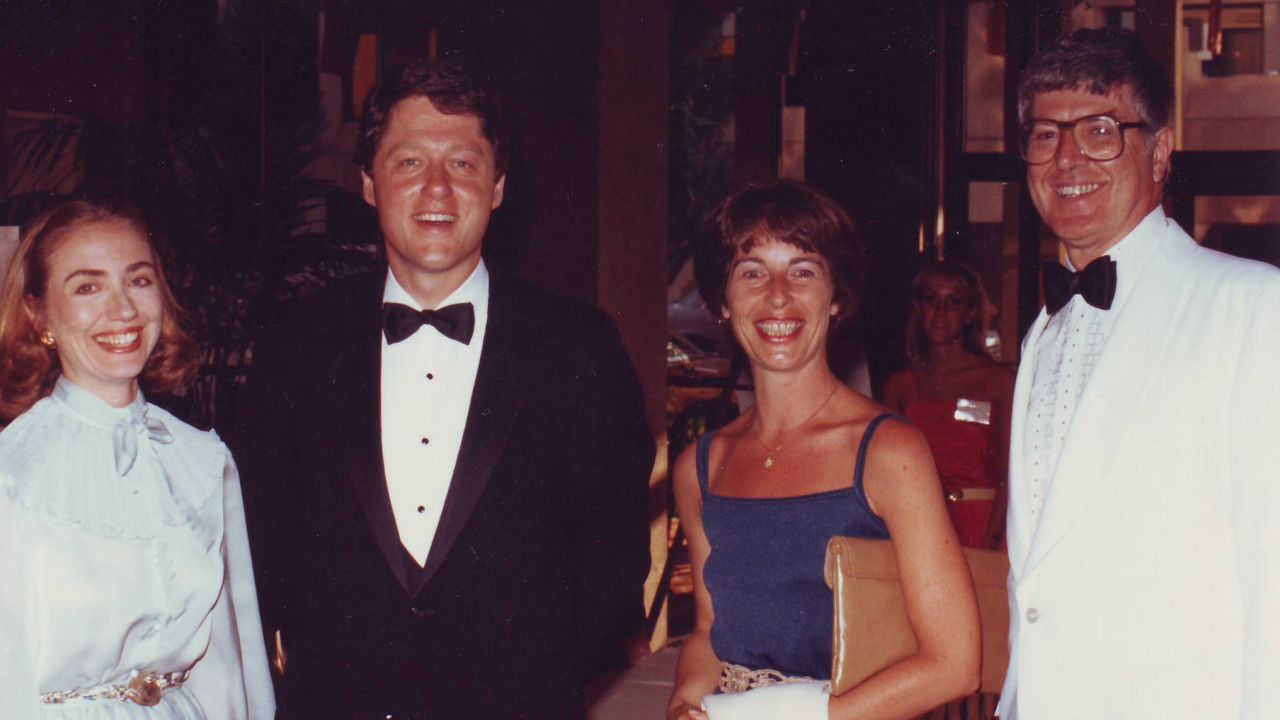 Hillary and Bill Clinton with Diane and Jim Blair at a formal event.