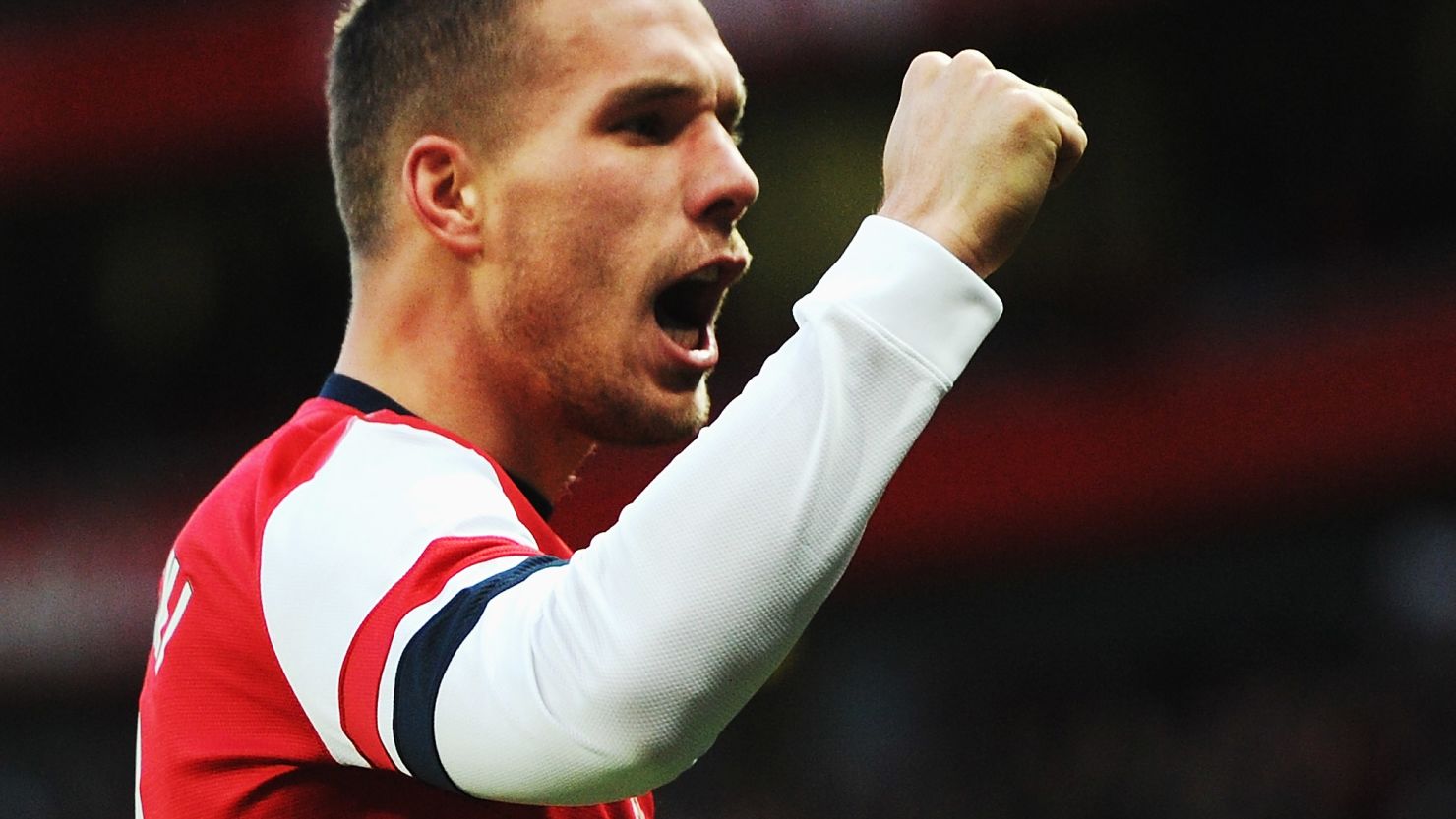 Lukas Podolski's second goal for Arsenal proved decisive in a 2-1 FA Cup win over Liverpool.