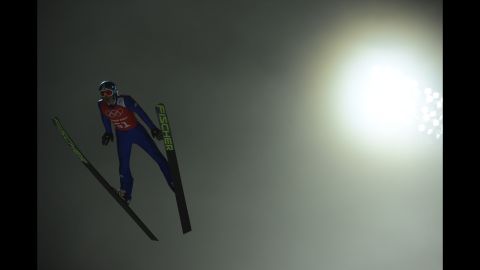 Germany's Richard Freitag jumps in the fog while training for the men's large hill ski jumping event.